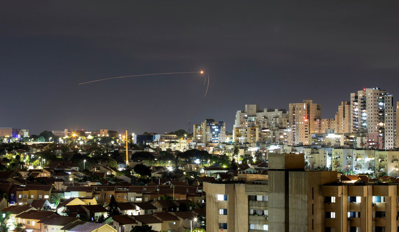 Streaks of light are seen as Israel's Iron Dome anti-missile system